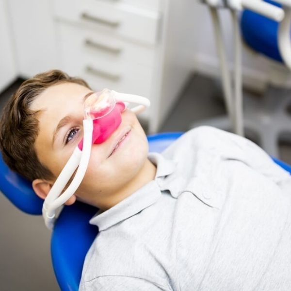 Relaxed patient during dental procedure with nitrous oxide